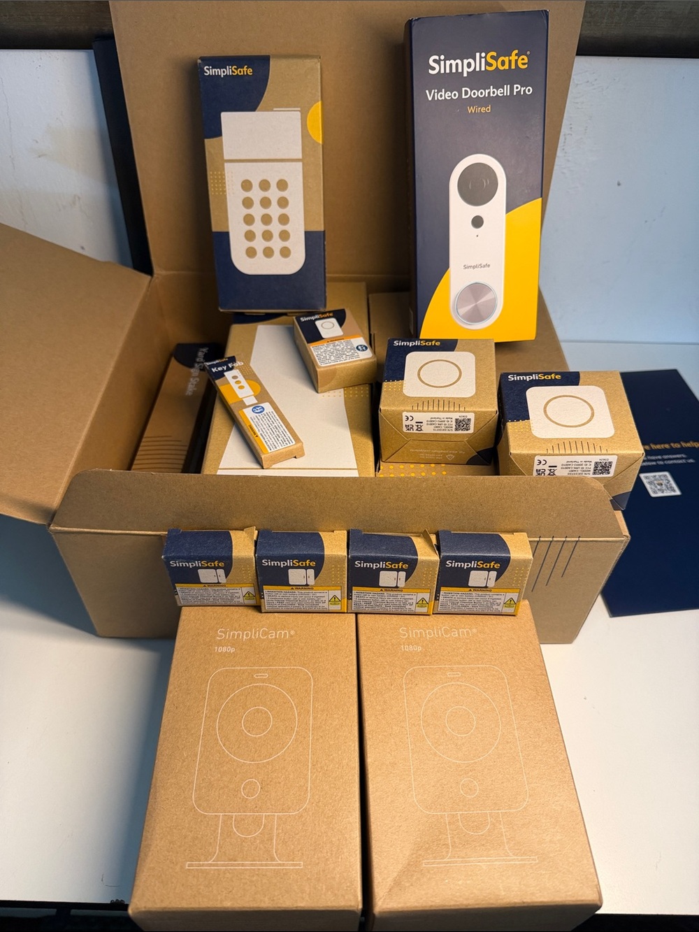 SimpilSafe  13 piece home security system New in Box